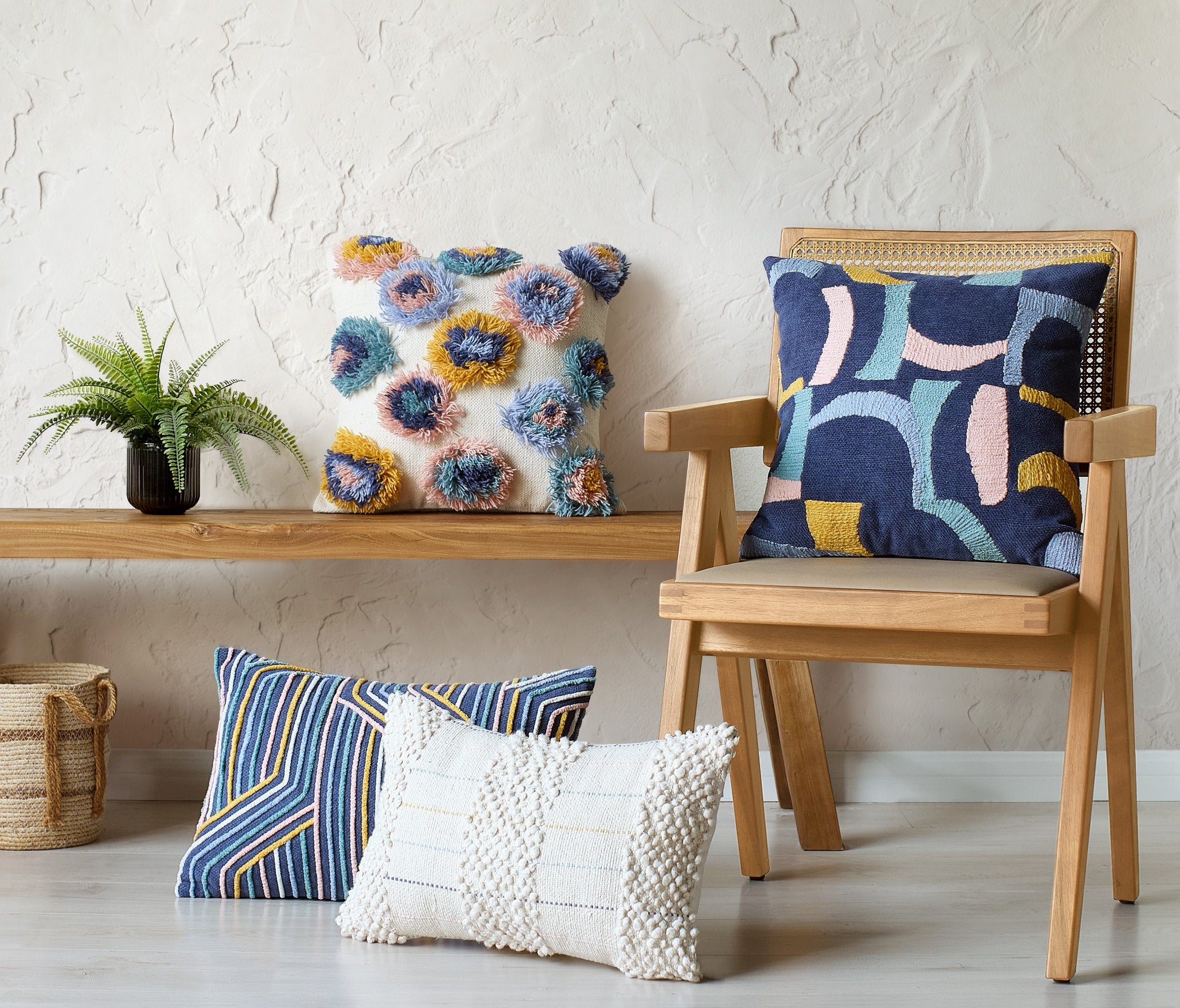 Baubles Embroidered Throw Pillow shown alongside other designs in the same collection, 12x20 inch