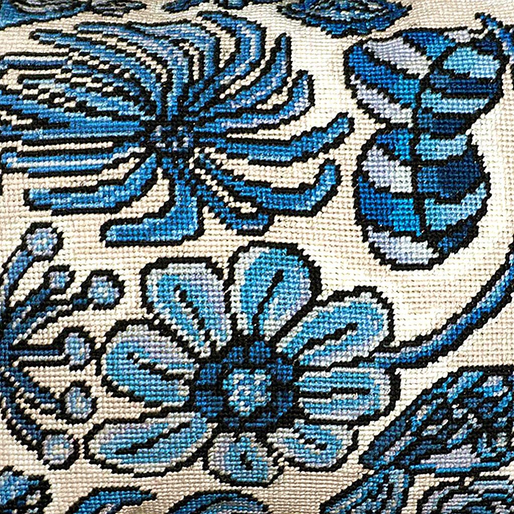 Closeup of Bloomer Morning Gilhooly Delft Floral needlepoint throw pillow highlighting hand-stitched wool craftsmanship and fabric detail