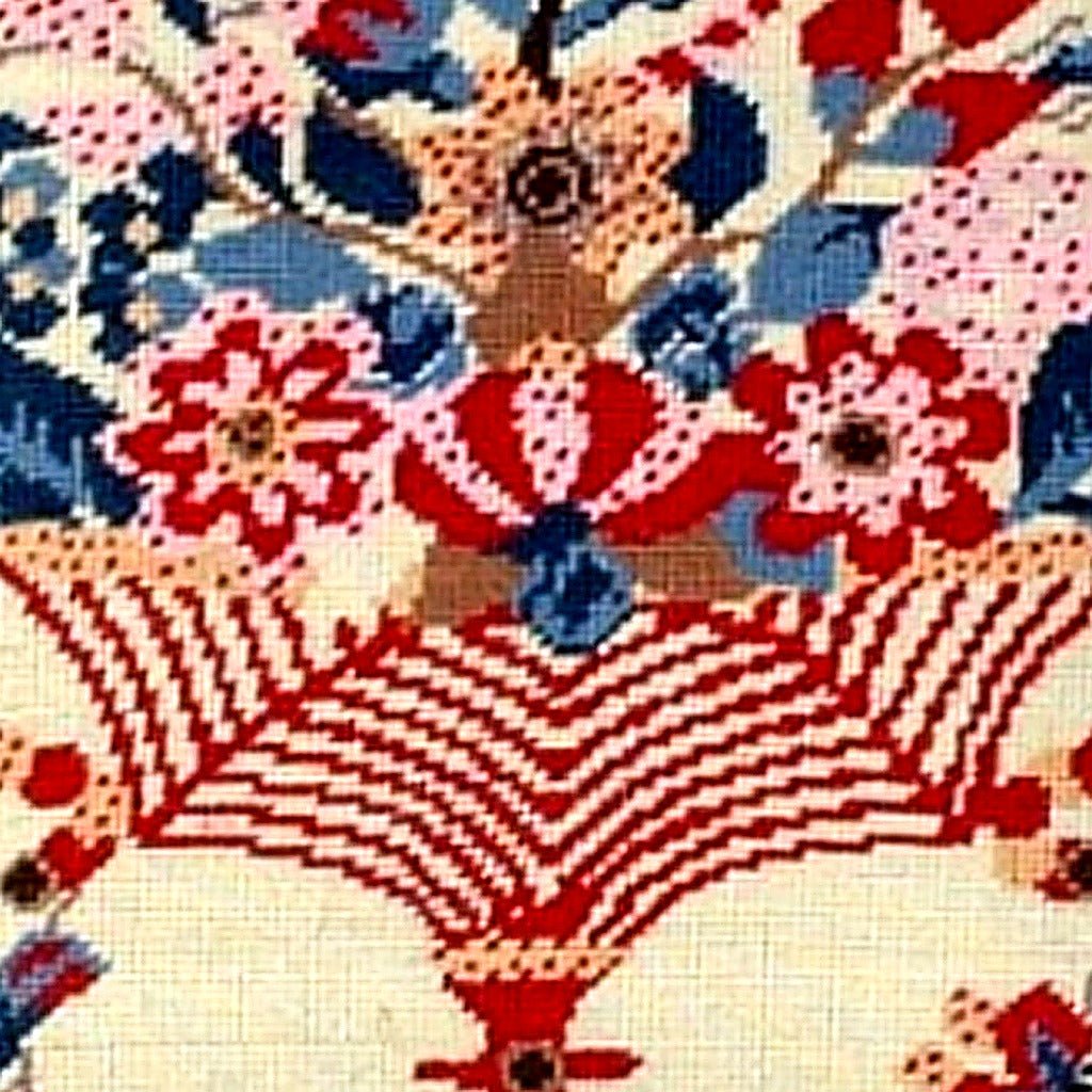 Blue Bird Red Vase pillow fabric closeup showing hand-embroidered needlepoint wool texture and color detail