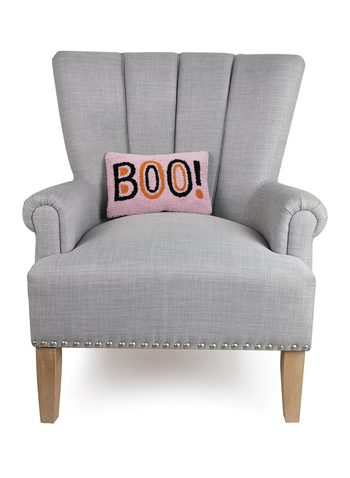 Boo Hooked Wool Halloween Throw Pillow on an armchair, showing the throw pillow at room scale, 8x12 inch