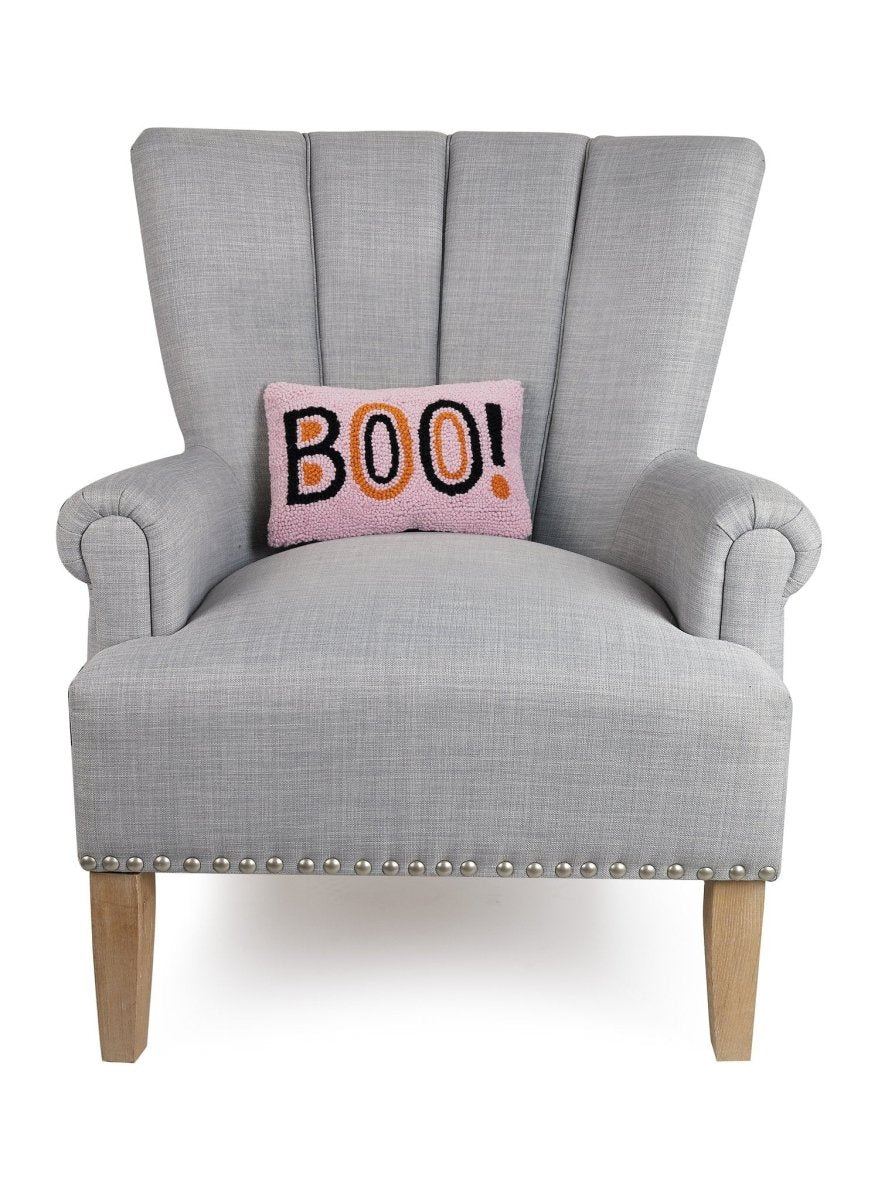 Boo Hooked Wool Halloween Throw Pillow on an armchair, showing the throw pillow at room scale, 8x12 inch