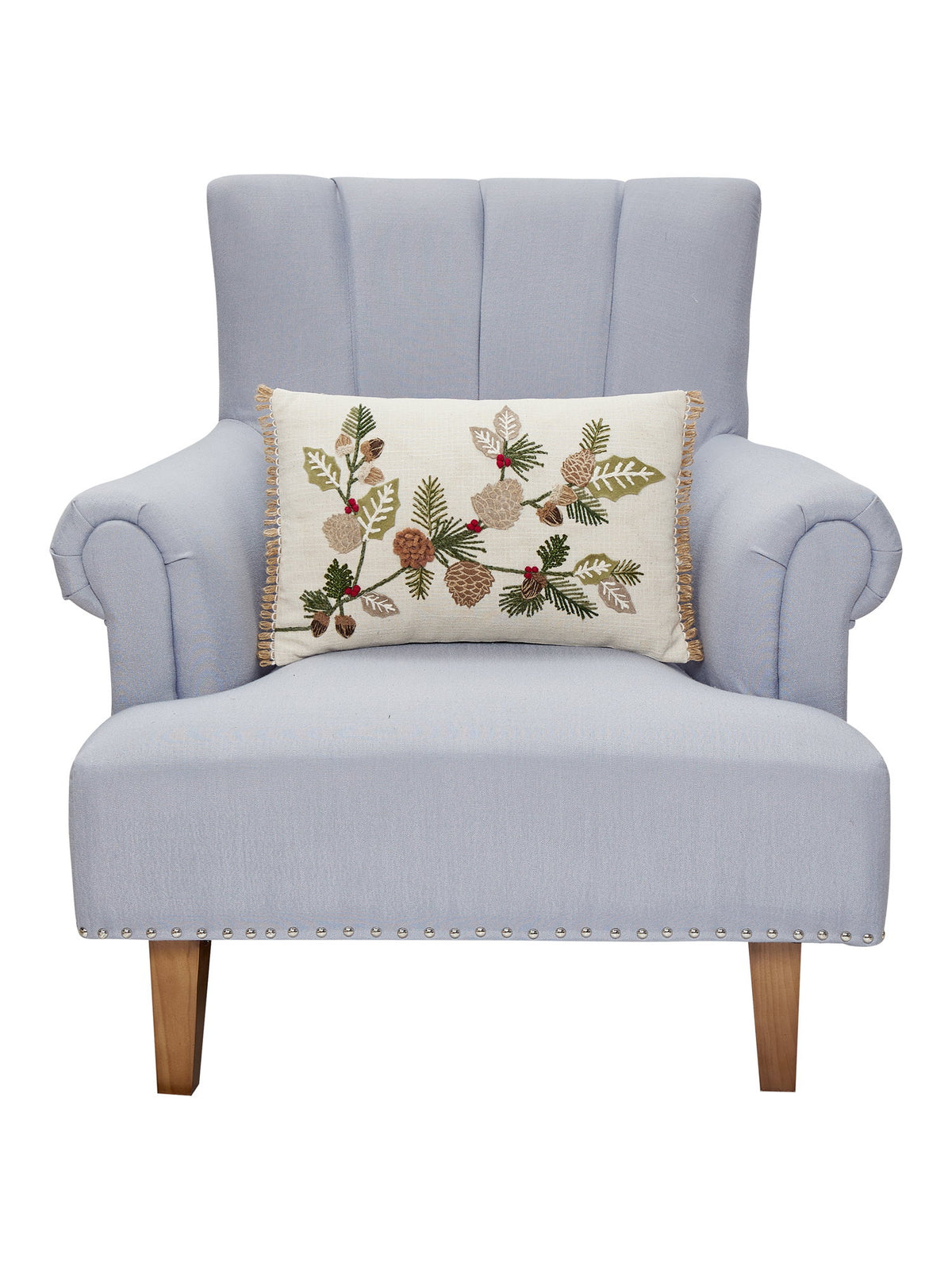 Branches Embroidered Christmas Throw Pillow on an armchair, showing the throw pillow at room scale, 12x18 inch
