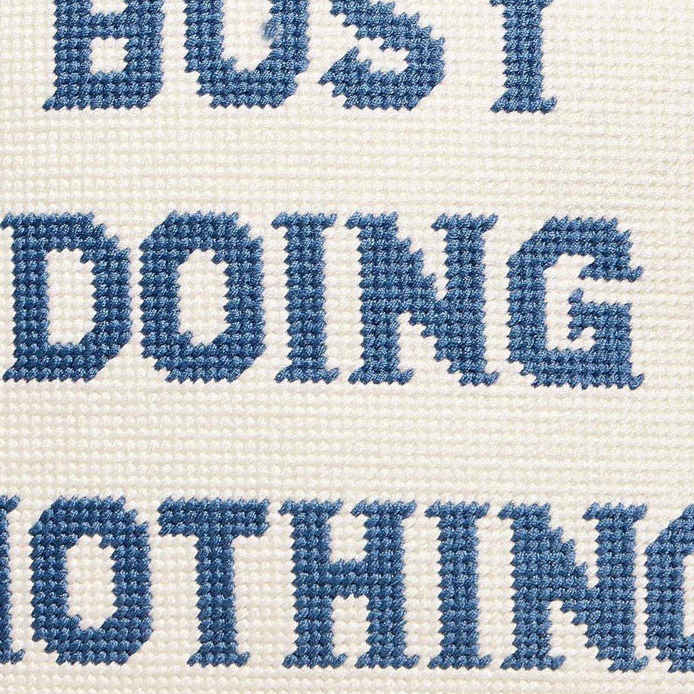 Busy Doing Nothing Embroidered Needlepoint Throw Pillow, close-up detail