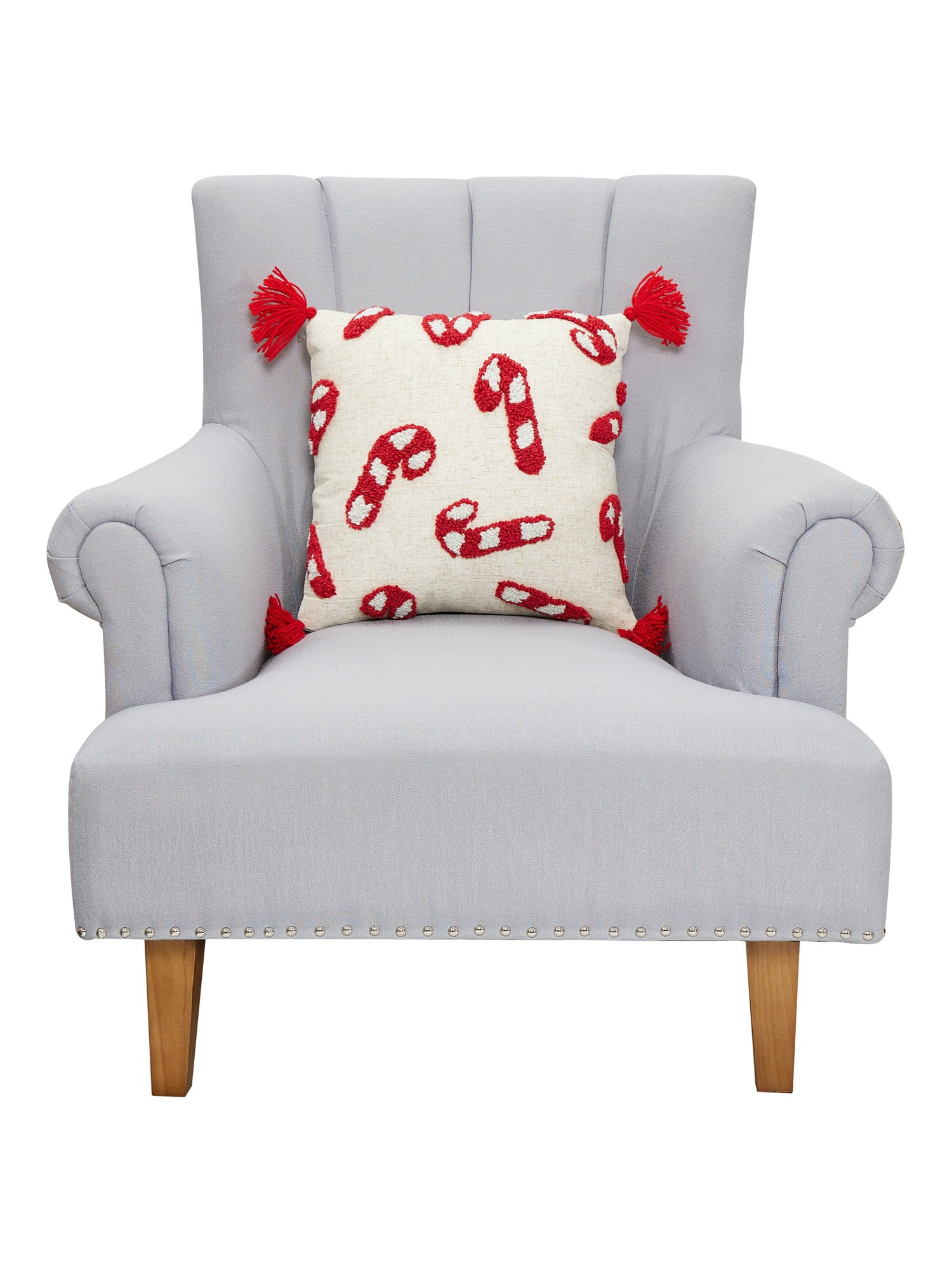 Candy Canes with Tassels Hooked Christmas Throw Pillow on an armchair, showing the throw pillow at room scale, 16x16 inch