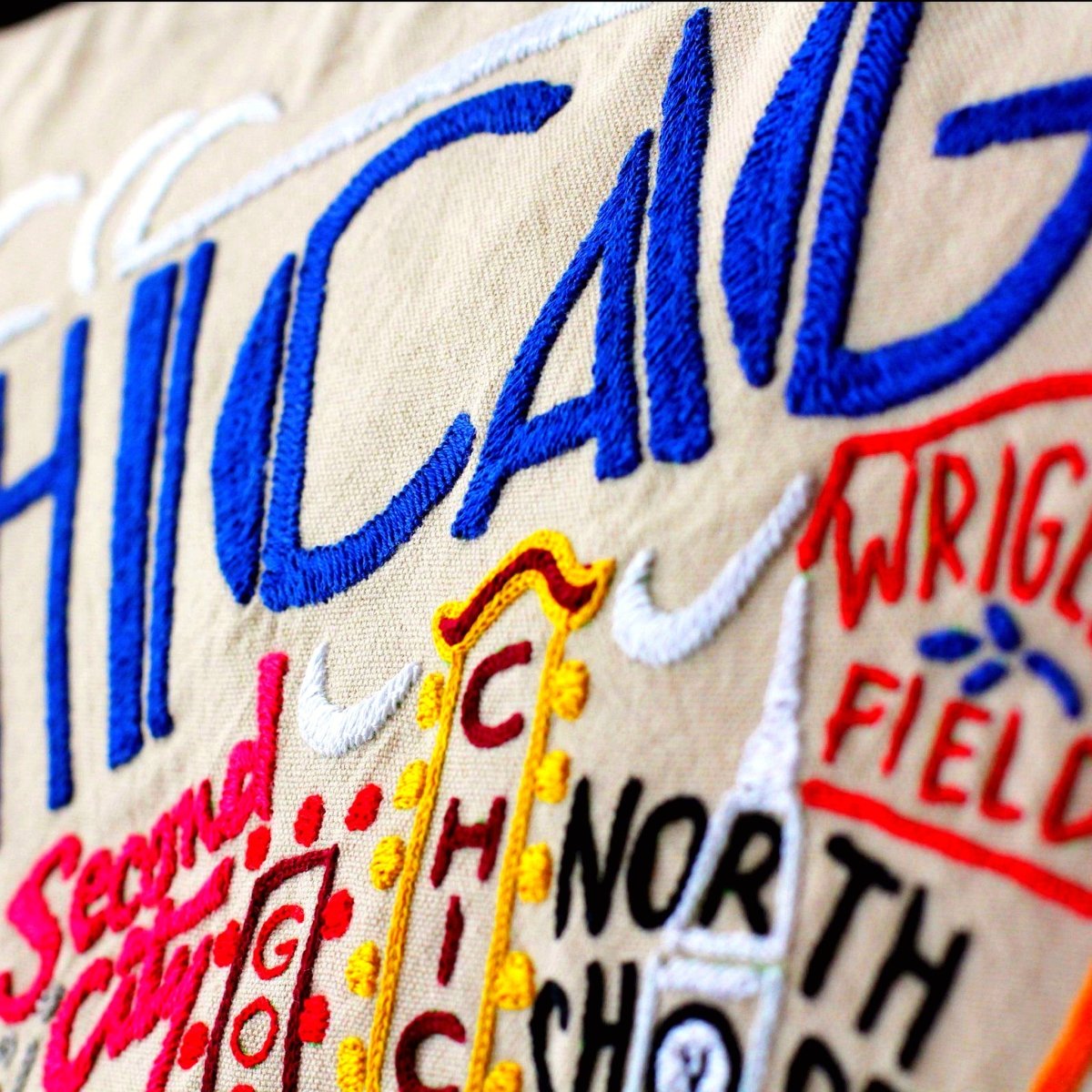 Chicago, IL Windy City Embroidered Travel Throw Pillow - close-up detail of hand-embroidered needlepoint stitching