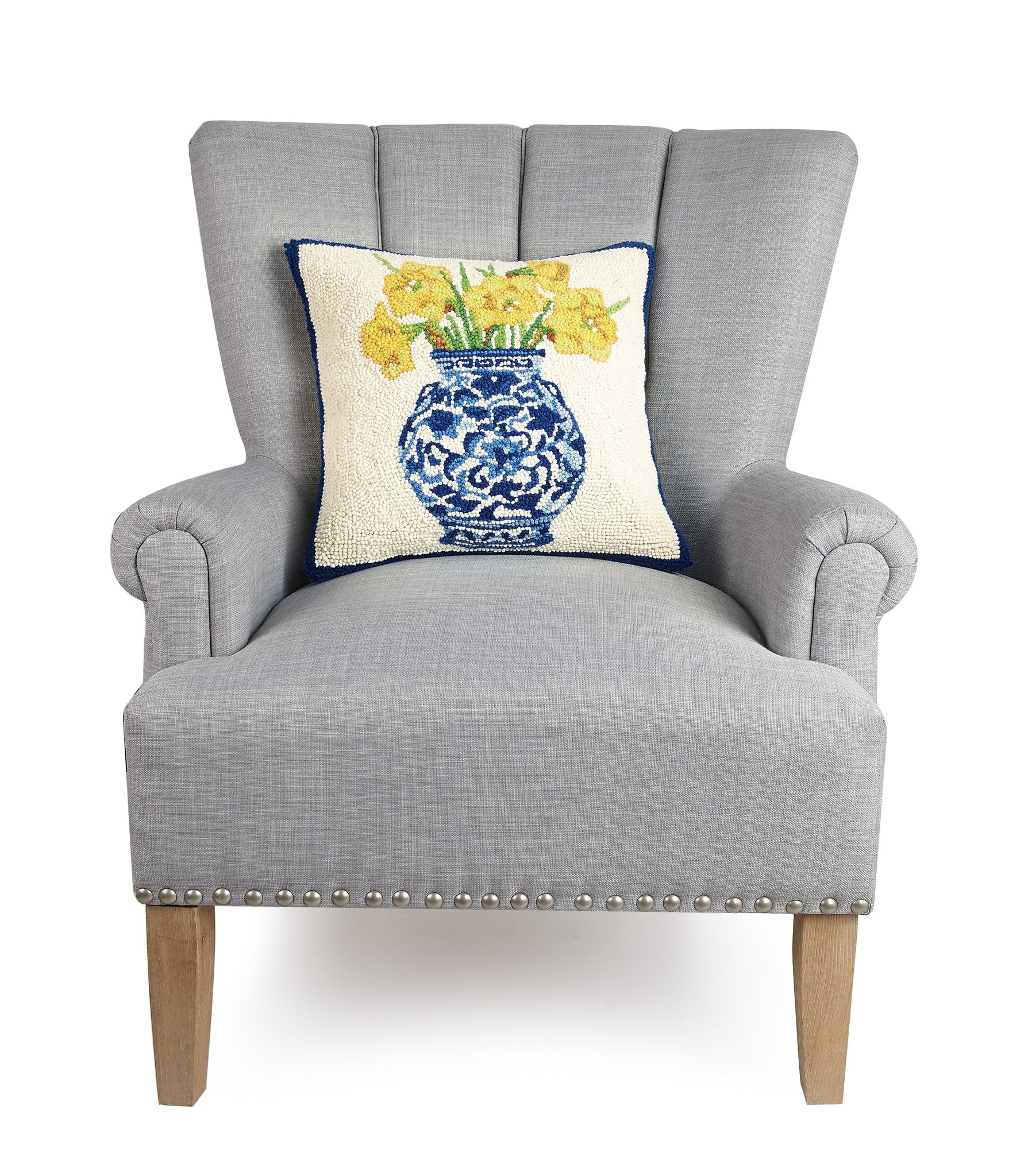 Chinoiserie Vase Daffodils Hooked Wool Throw Pillow on an armchair, showing the throw pillow at room scale, 16x16 inch