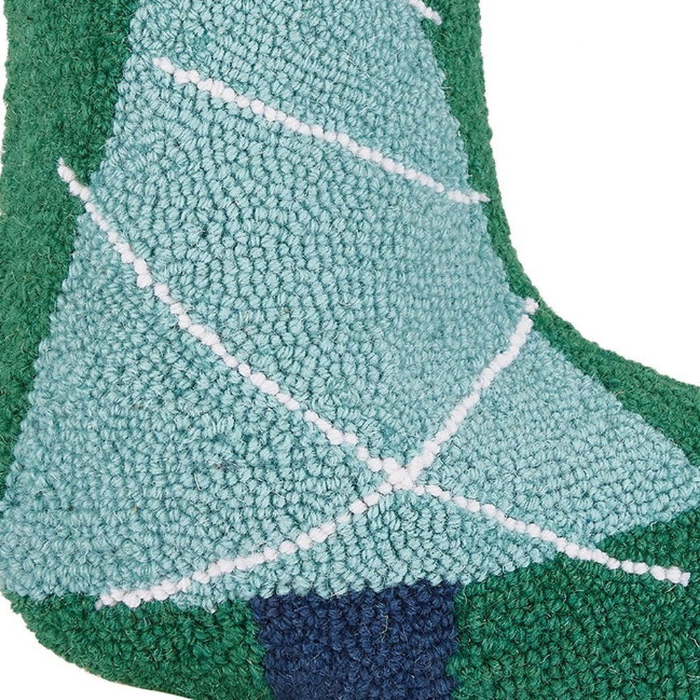 Closeup of Christmas Tree with Pom Pom Tassel Hooked Wool Stocking showing stitch texture and craftsmanship detail