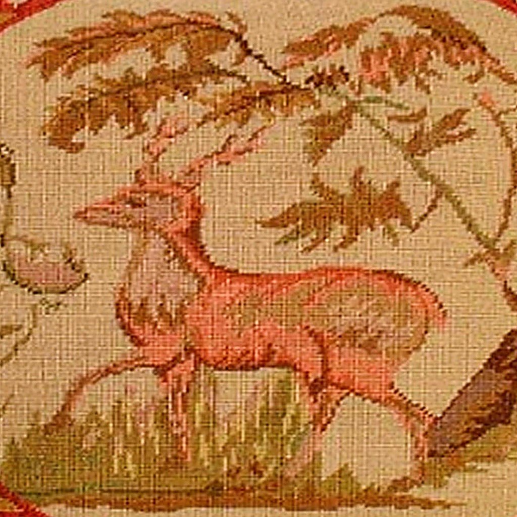 Hand-stitched wool detail of Classic Gold Lancaster Deer needlepoint pillow showing intricate weave pattern and texture