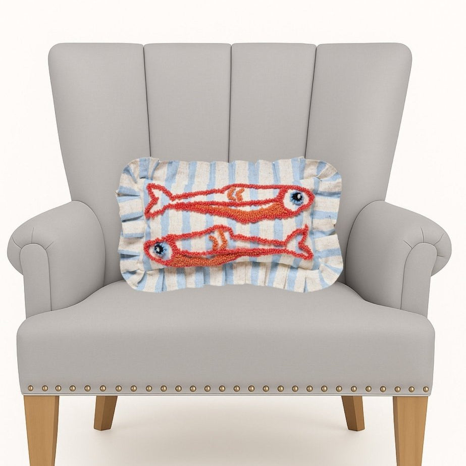 Coastal Sardines Tufted Hooked Throw Pillow on an armchair, showing the throw pillow at room scale, 9x16 inch