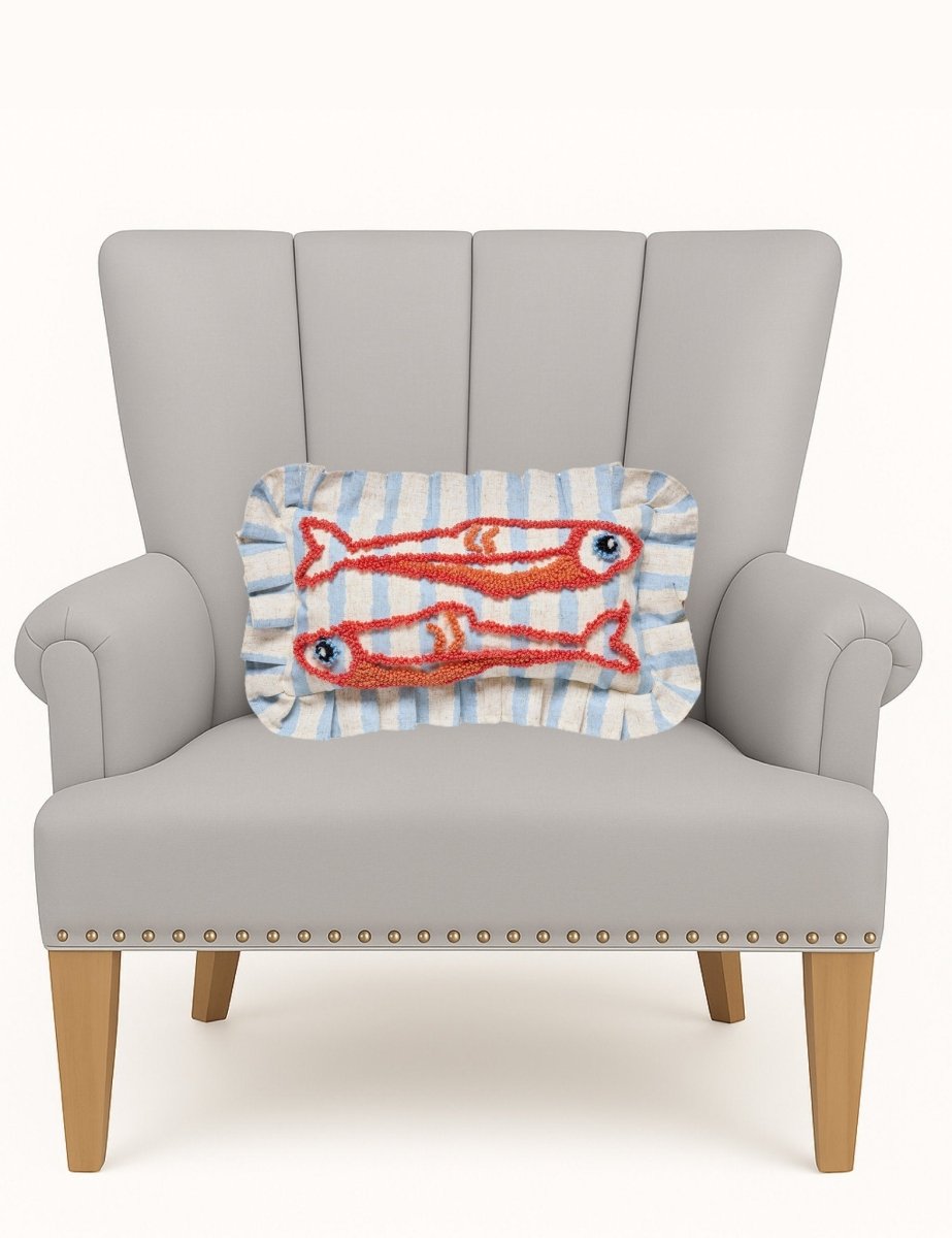 Coastal Sardines Tufted Hooked Throw Pillow on an armchair, showing the throw pillow at room scale, 9x16 inch