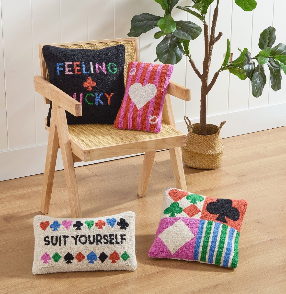 Feeling Lucky Hooked Wool Throw Pillow shown alongside other designs in the same collection, 14x14 inch