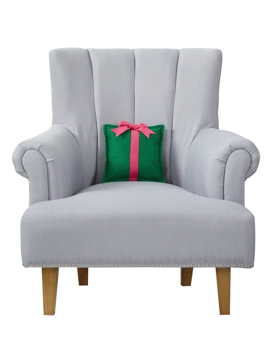 Felt Green Present Embroidered Throw Pillow on an armchair, showing the throw pillow at room scale, 10x10 inch