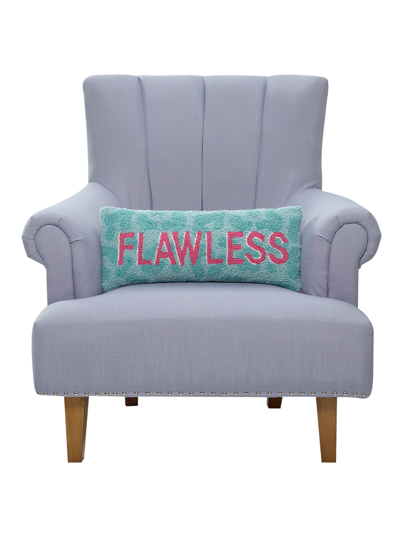 Flawless Hooked Wool Throw Pillow on an armchair, showing the throw pillow at room scale, 8x20 inch