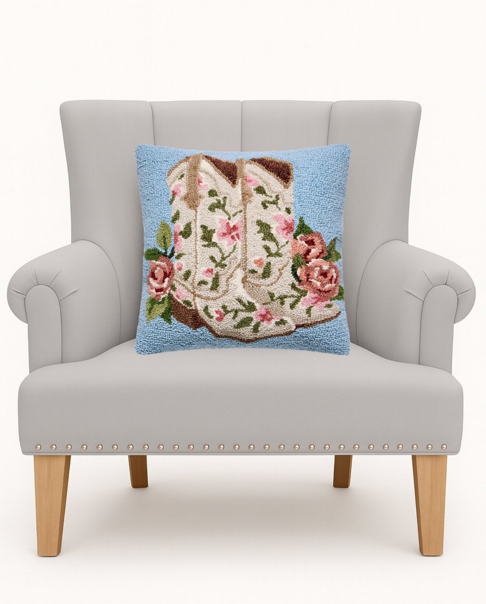 Floral Cowgirl Boots Hooked Wool Throw Pillow on an armchair, showing the throw pillow at room scale, 16x16 inch