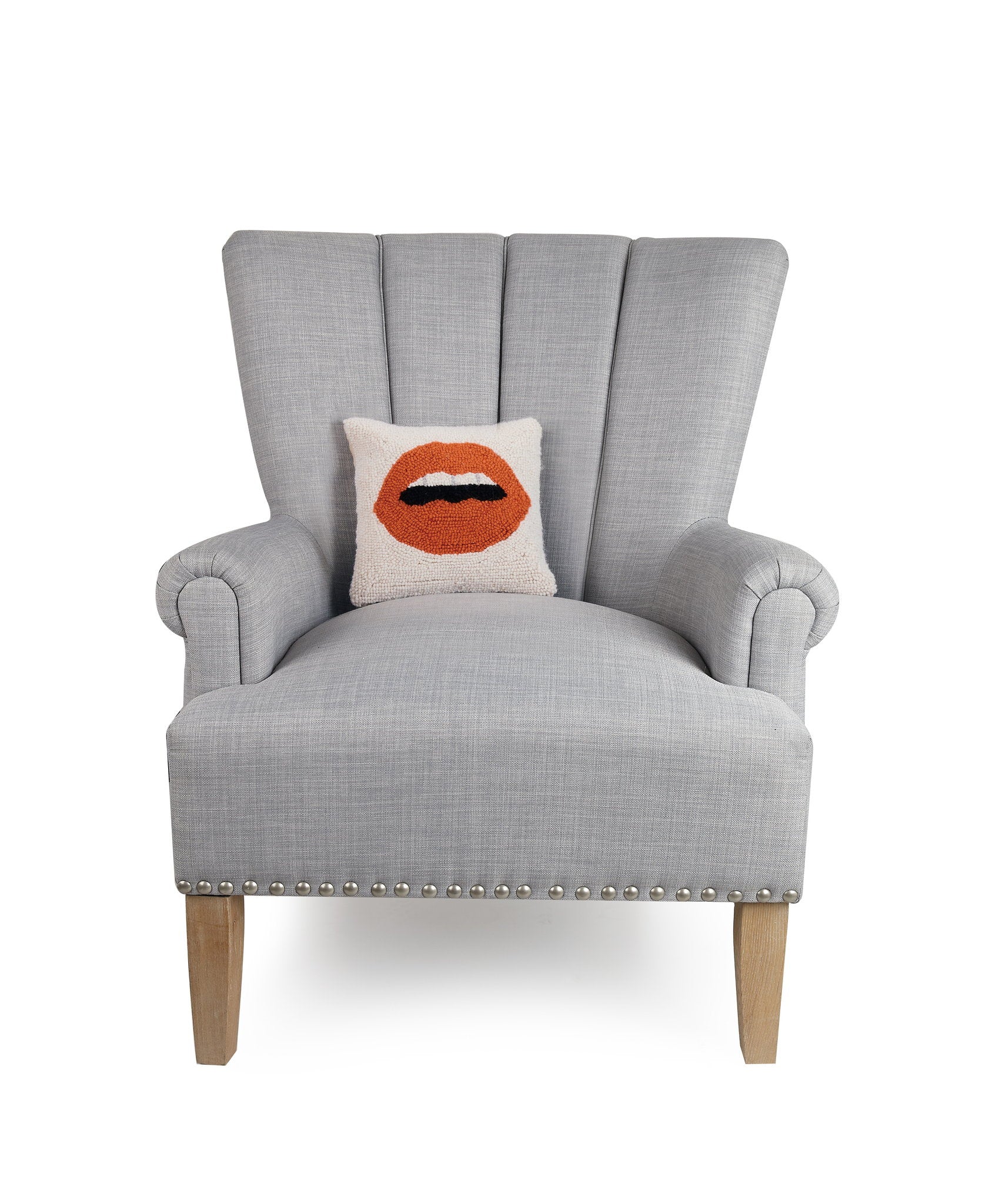 Free Speech Hooked Wool Throw Pillow on an armchair, showing the throw pillow at room scale, 8x12 inch