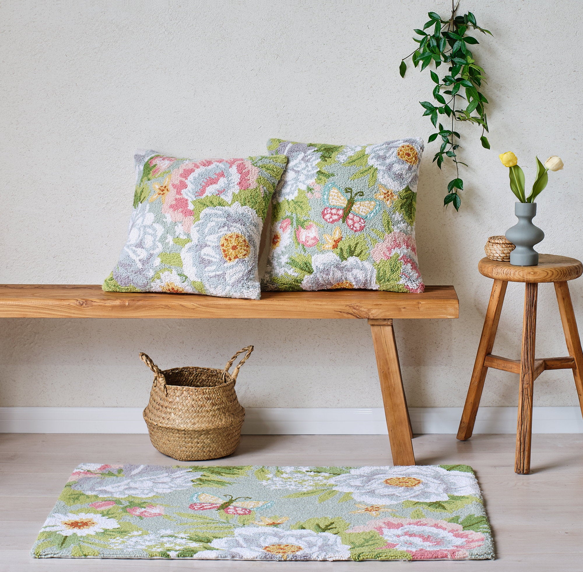 Garden Party Hooked Wool Throw Pillow shown alongside other designs in the same collection, 18x18 inch