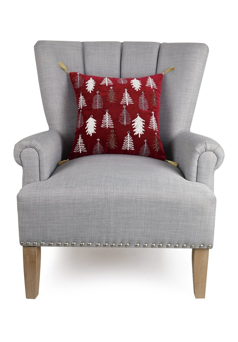 Gilded Trees Embroidered Christmas Throw Pillow on an armchair, showing the throw pillow at room scale, 16x16 inch