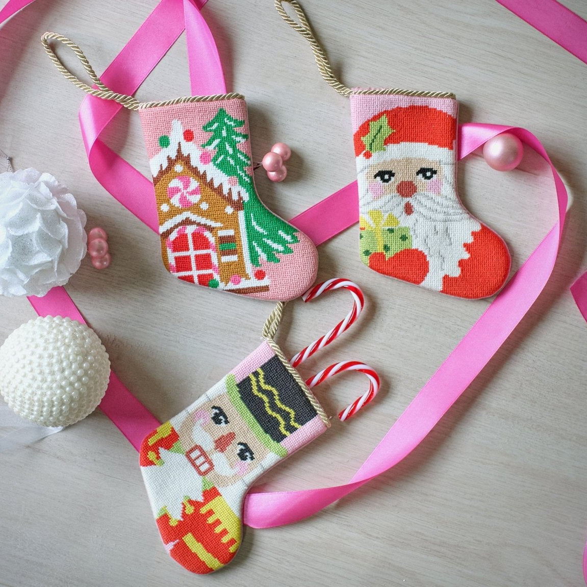 Gingerbread House Mini Embroidered Needlepoint Christmas Stocking, 6x4 inch, four mini stockings on pink ribbon with white ornaments