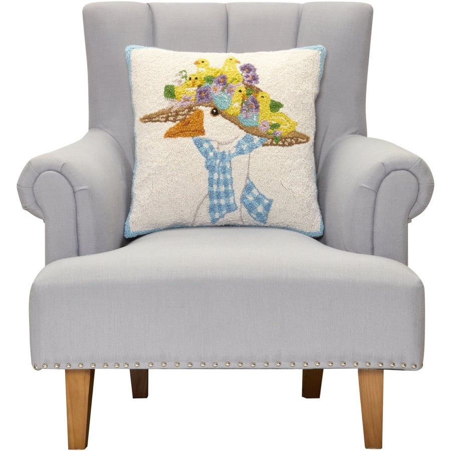 Goose Hooked Wool Throw Pillow on an armchair, showing the throw pillow at room scale, 18x18 inch