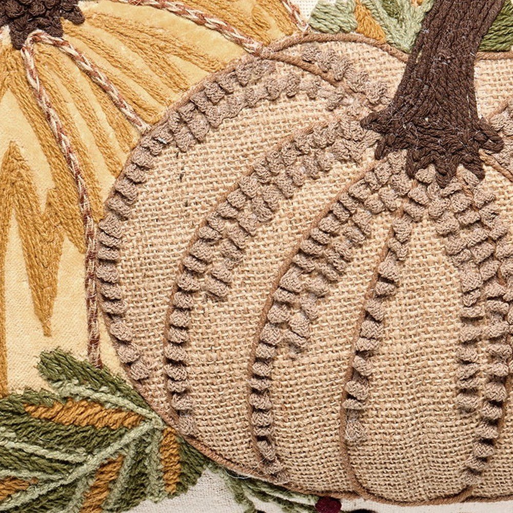 Closeup of Harvest Pumpkin Trio Embroidered Fall Harvest Throw Pillow showing stitch texture and craftsmanship detail