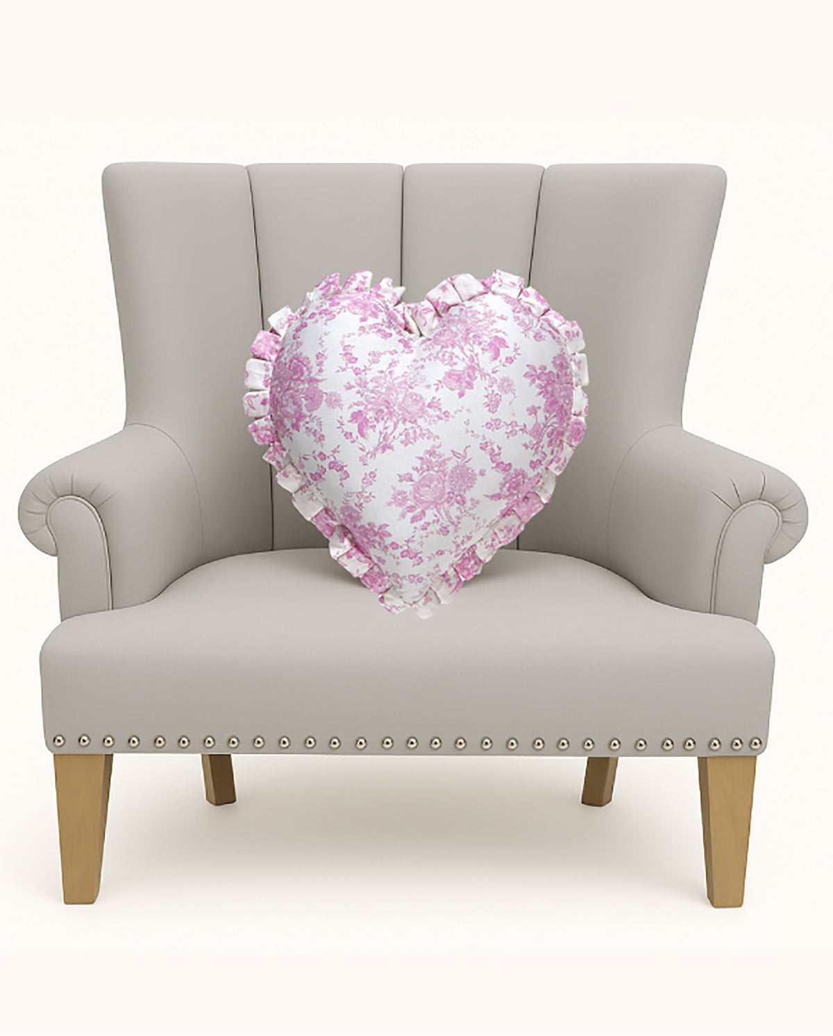 Heart Toile Printed Throw Pillow, 14x14 inch, the pink heart pillow alone on a gray chair