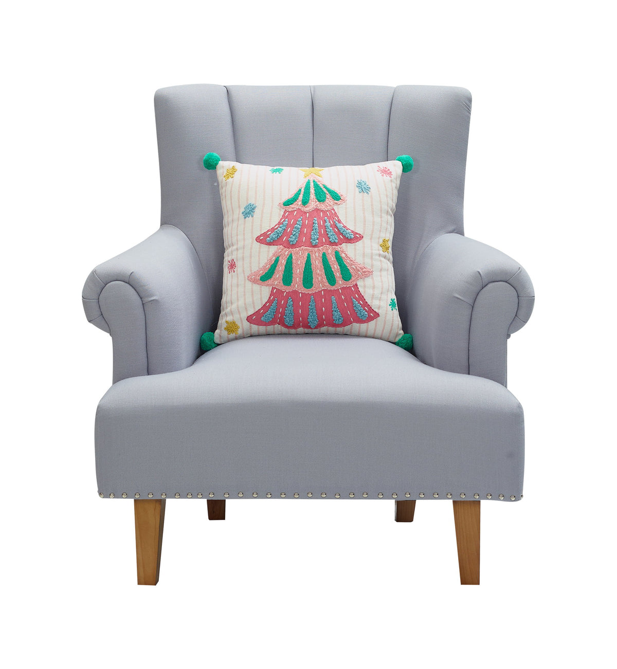 Holiday Bright's Tree with Pom Poms Embroidered Christmas Throw Pillow, 16x16 inch, tree design on a gray armchair