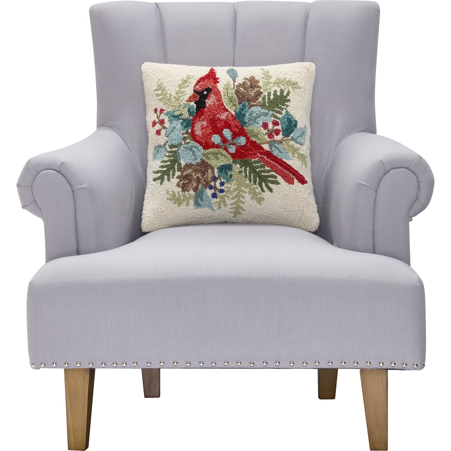 Holiday Cardinal Hooked Wool Throw Pillow on an armchair, showing the throw pillow at room scale, 16x16 inch