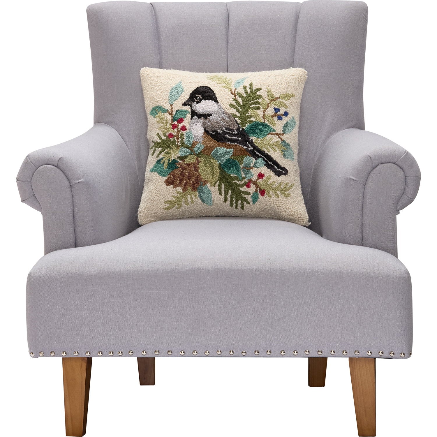 Holiday Chickadee Hooked Wool Throw Pillow on an armchair, showing the throw pillow at room scale, 16x16 inch