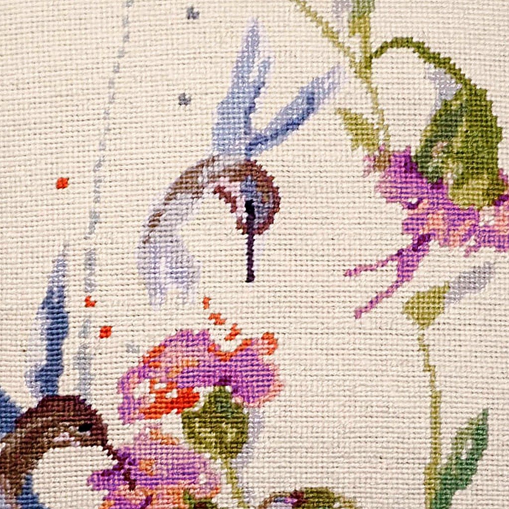 Hand-stitched wool detail of Hummingbirds needlepoint pillow showing intricate weave pattern and texture