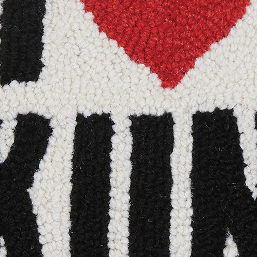 Closeup of I Love Skiing Hooked Wool Throw Pillow showing stitch texture and craftsmanship detail