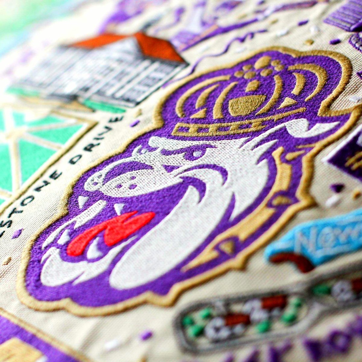 James Madison University Dukes Embroidered College Pillow - close-up detail of hand-embroidered needlepoint stitching