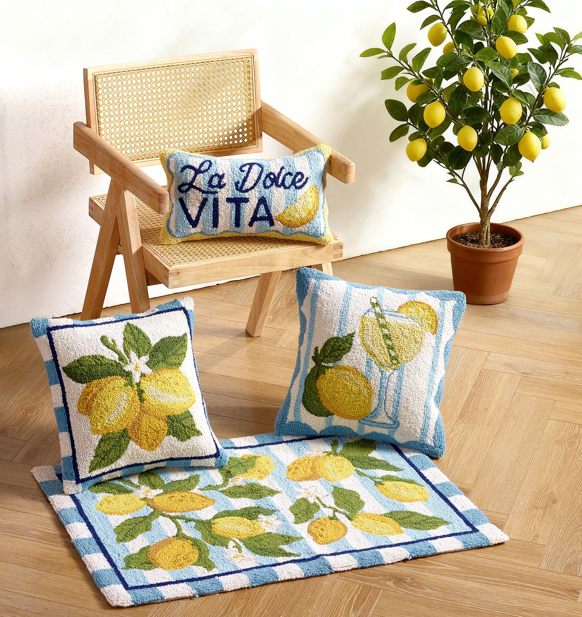 Limoncello Spritz Hooked Wool Throw Pillow shown alongside other designs in the same collection, 16x16 inch