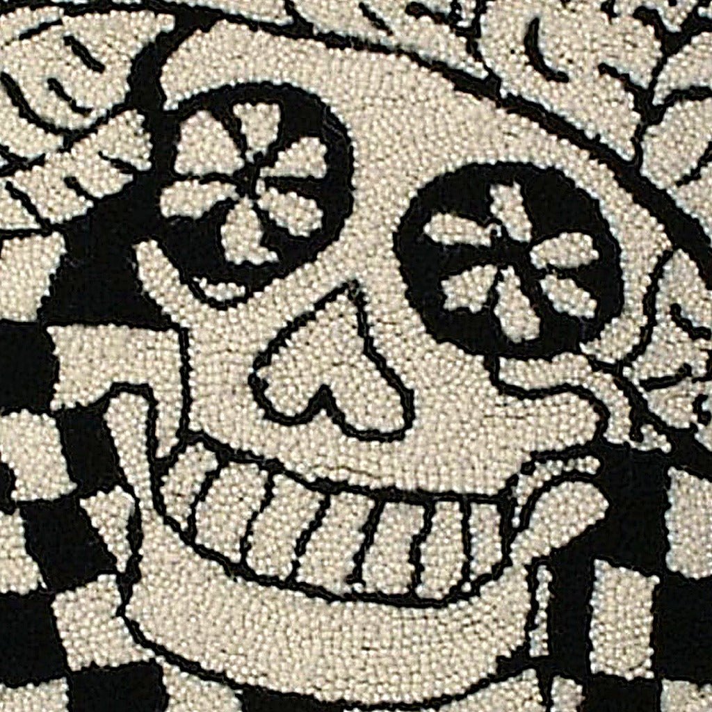 Mexican Day of the Dead Decorative Wool Hooked pillow fabric closeup showing hand-embroidered needlepoint wool texture and color detail