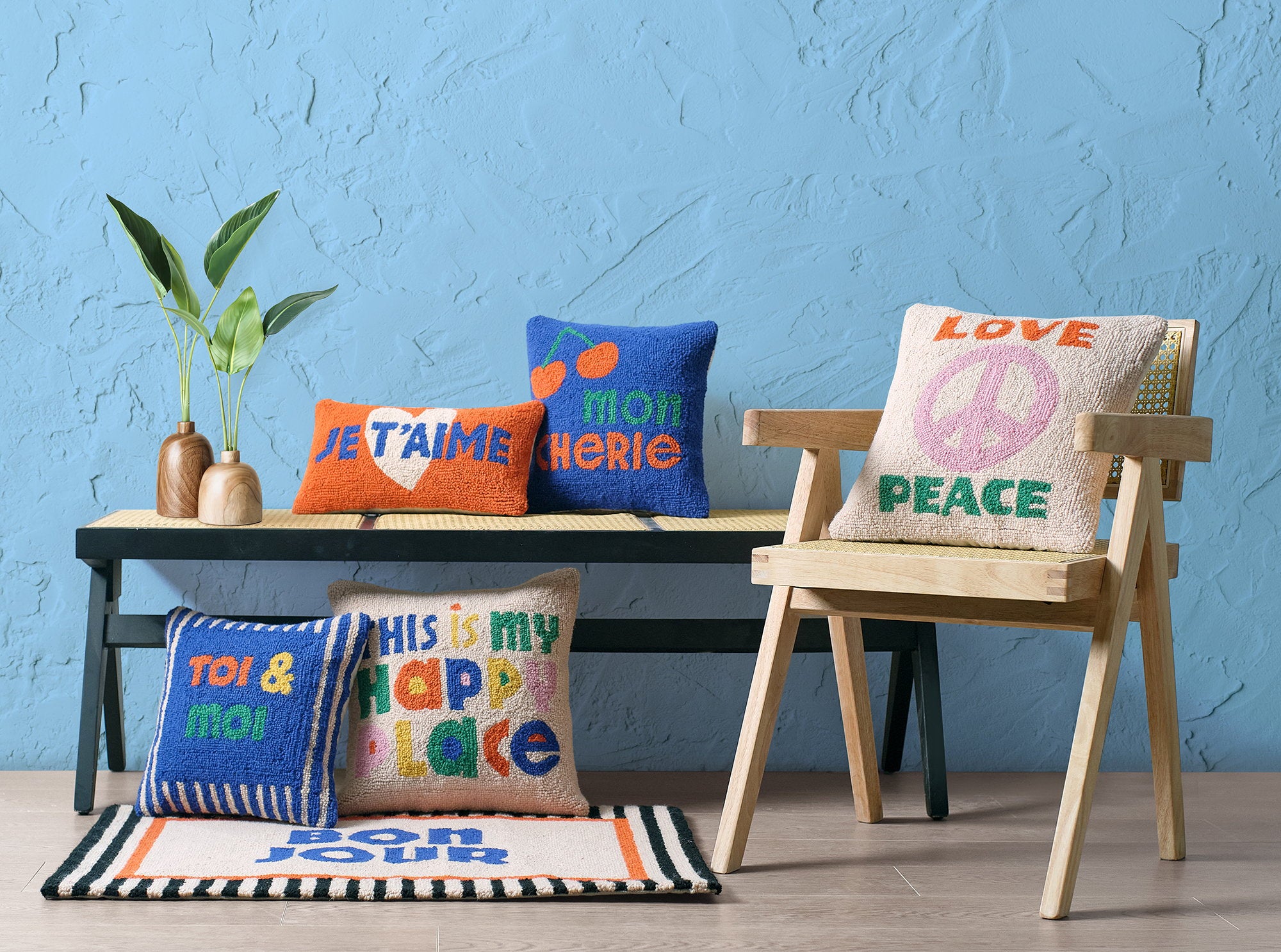 Mon Cherie Hooked Wool Throw Pillow shown alongside other designs in the same collection, 14x14 inch