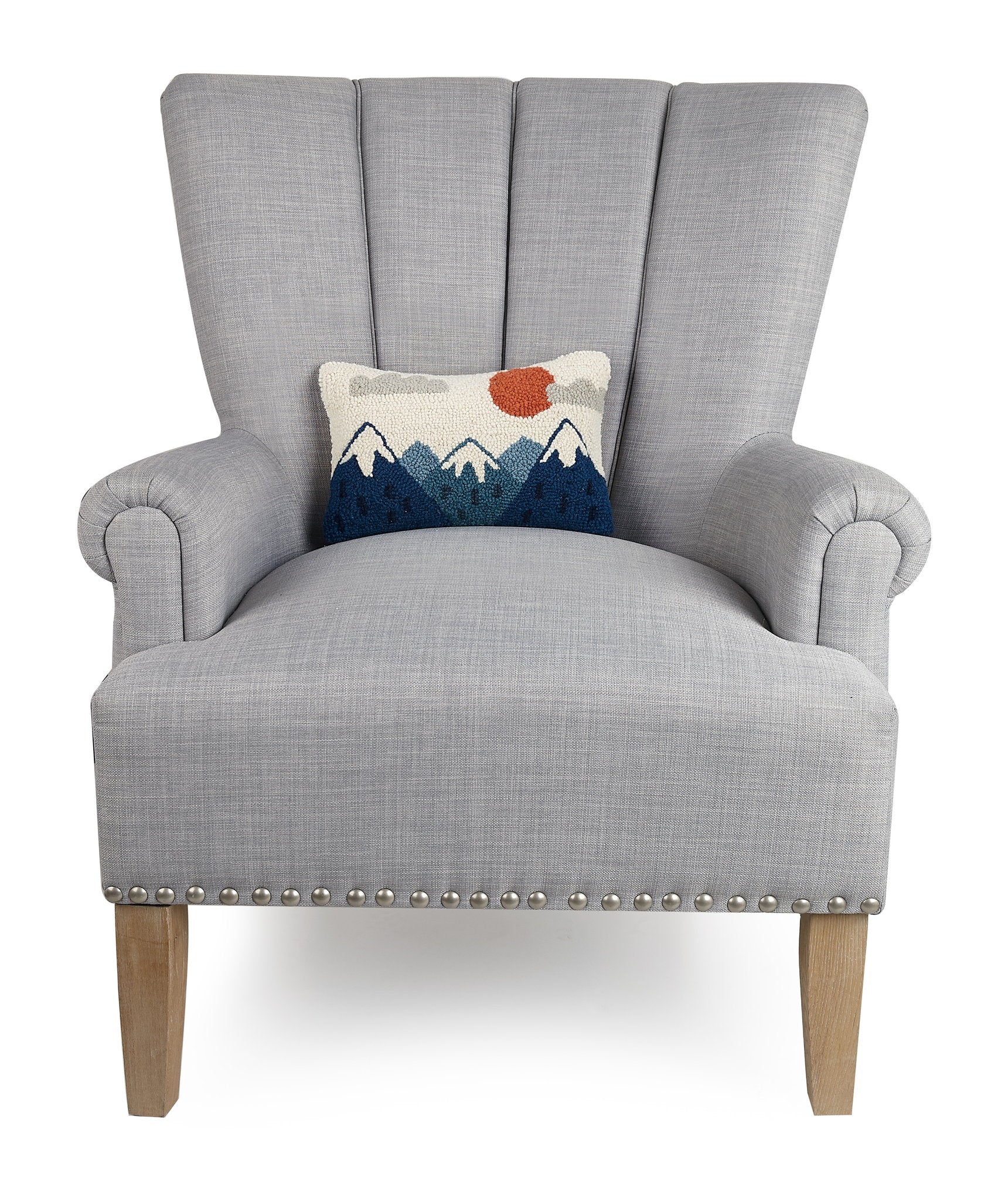Mountains Hooked Wool Throw Pillow on an armchair, showing the throw pillow at room scale, 8x12 inch