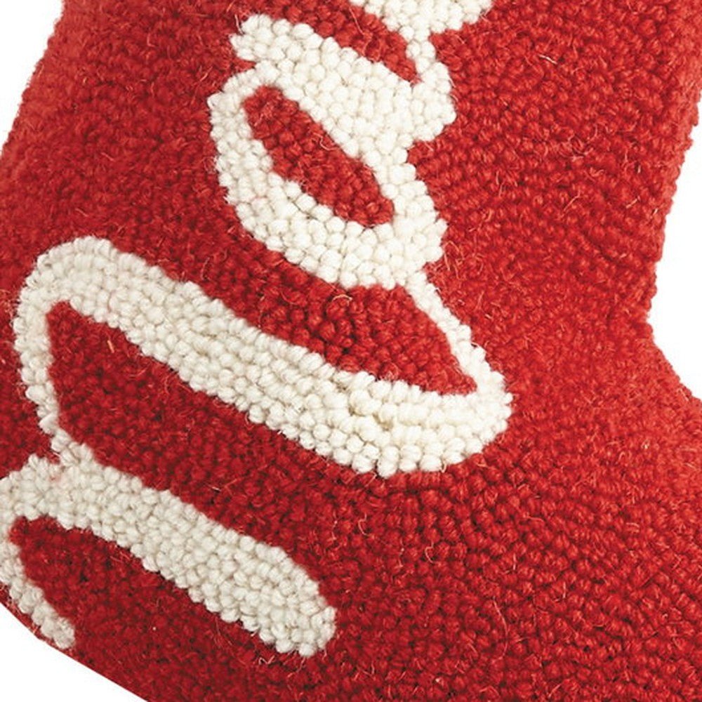Closeup of Naughty Hooked Wool Christmas Stocking showing stitch texture and craftsmanship detail
