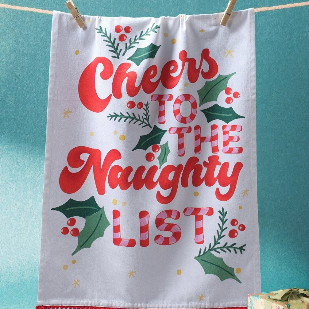 Naughty List with Pom Poms Christmas Kitchen Towel styled in a room setting, 18x25 inch