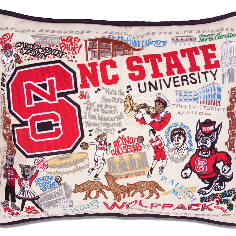 North Carolina State University Wolfpack hand-embroidered throw pillow featuring school colors and mascot imagery