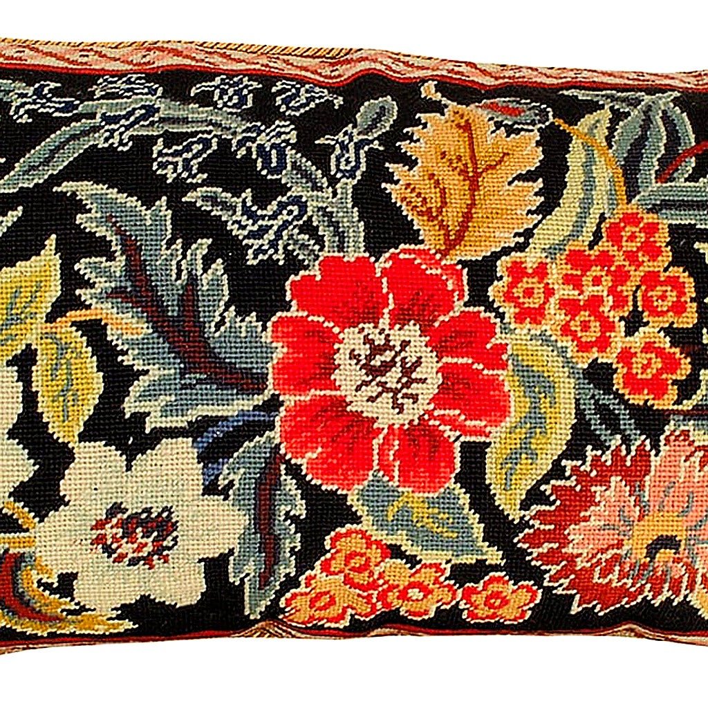 Closeup of Orvieto Floral Rich Botanical needlepoint throw pillow highlighting hand-stitched wool craftsmanship and fabric detail