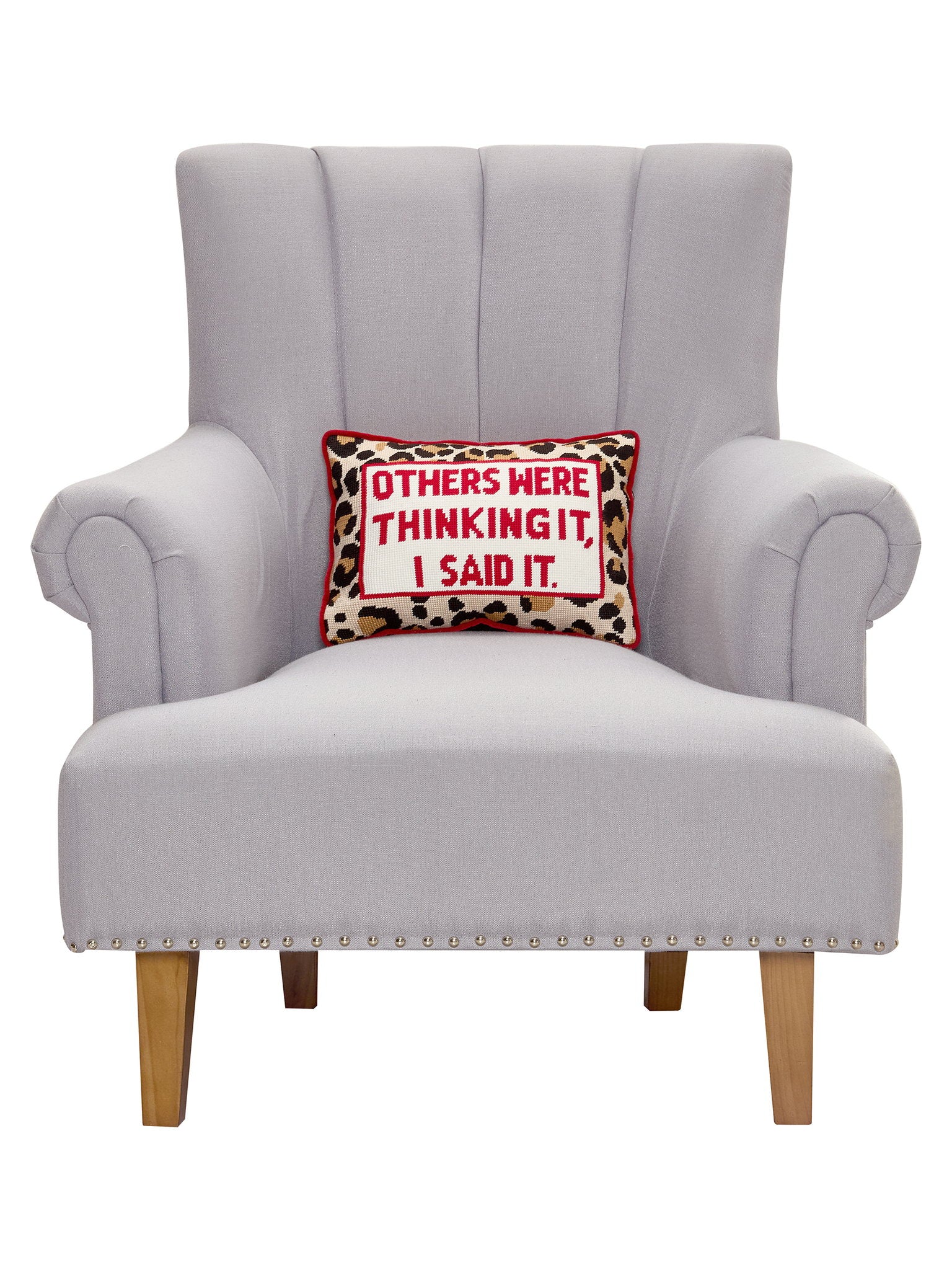 Others Were Thinking It Embroidered Needlepoint Throw Pillow on an armchair, showing the throw pillow at room scale, 10x14 inch