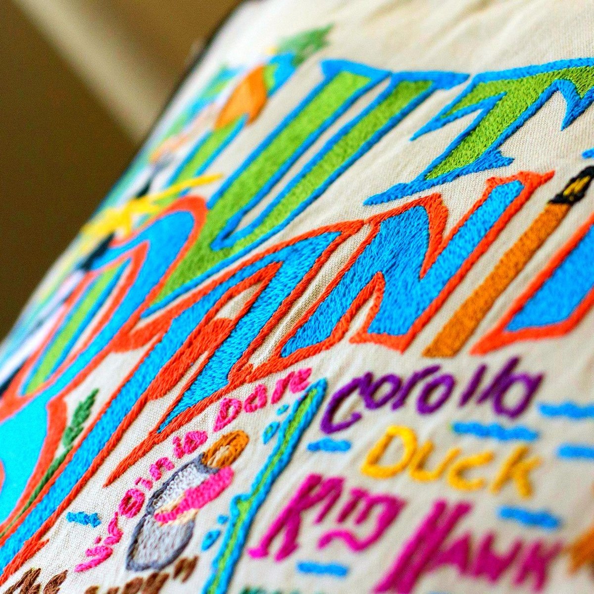 Outer Banks NC Seaside Embroidered Travel Throw Pillow - close-up detail of hand-embroidered needlepoint stitching