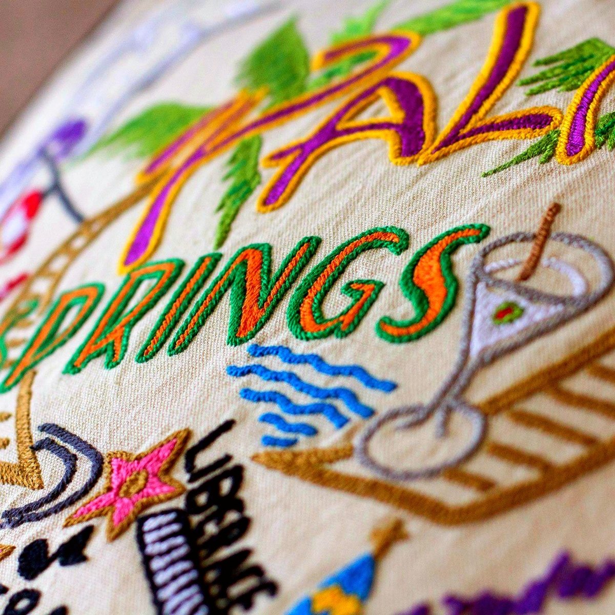 Palm Springs Desert Embroidered Travel Throw Pillow - close-up detail of hand-embroidered needlepoint stitching