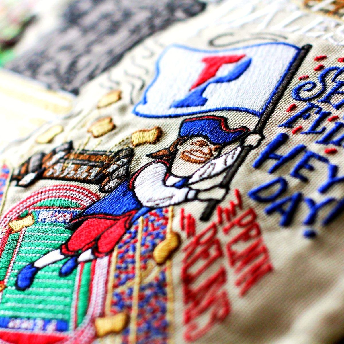 Pennsylvania Quakers Embroidered College Pillow - close-up detail of hand-embroidered needlepoint stitching