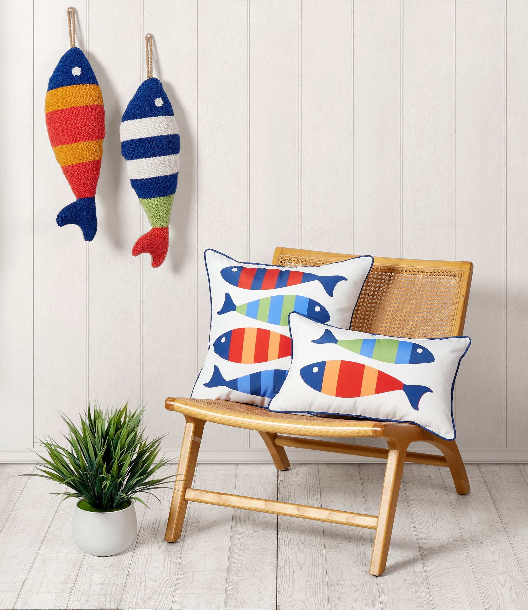 Picket Fish Shaped Hooked Wool Throw Pillow shown alongside other designs in the same collection, 8x22 inch