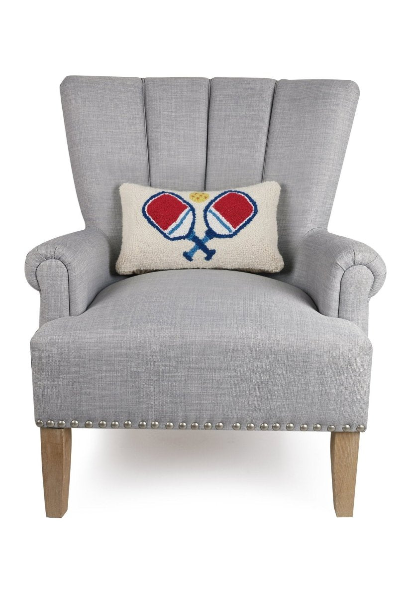 Pickleball Hooked Wool Throw Pillow on an armchair, showing the throw pillow at room scale, 9x16 inch