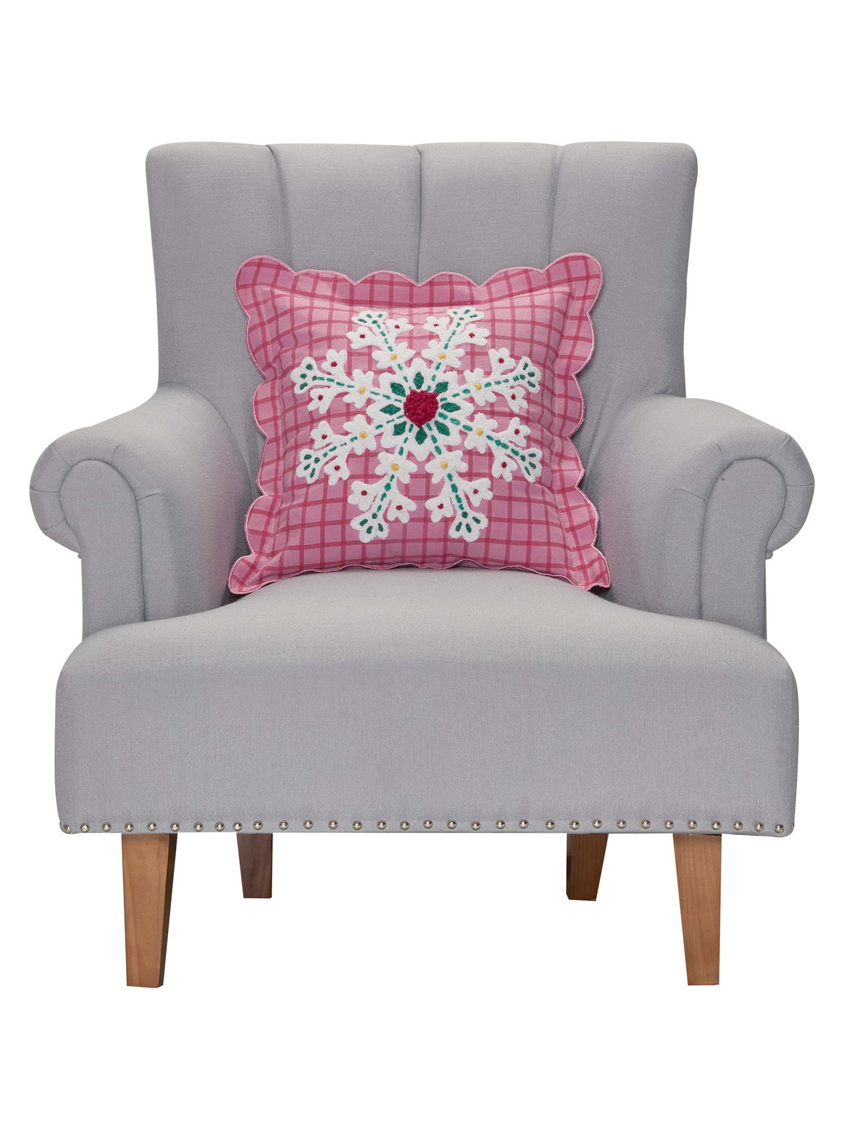 Pink Plaid Snowflake Embroidered Christmas Throw Pillow on an armchair, showing the throw pillow at room scale, 16x16 inch