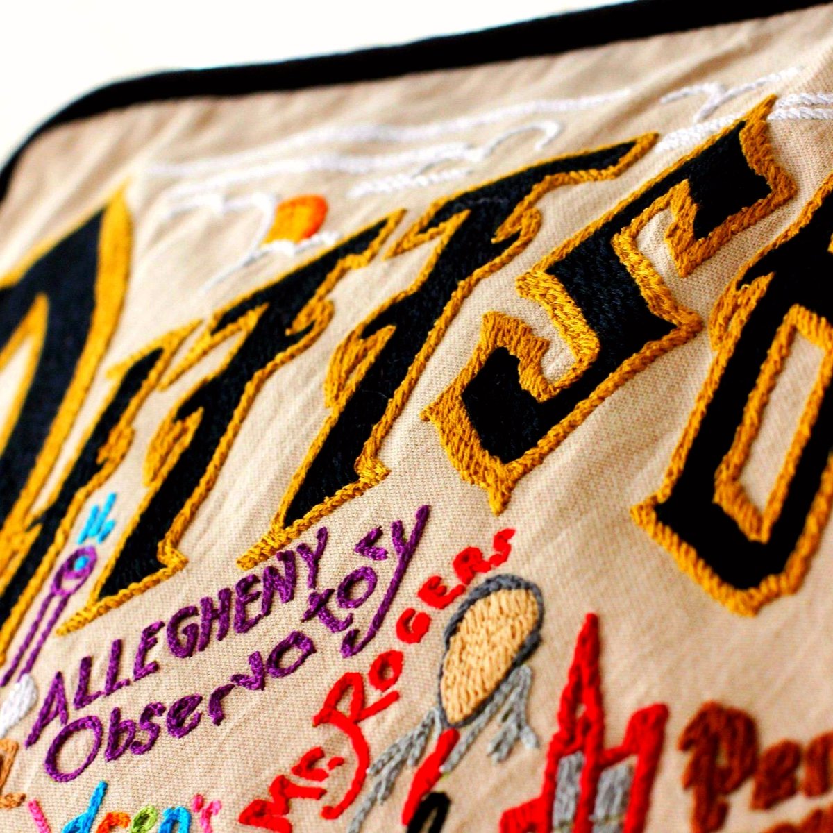Pittsburgh, PA Steel City Embroidered Travel Pillow - close-up detail of hand-embroidered needlepoint stitching