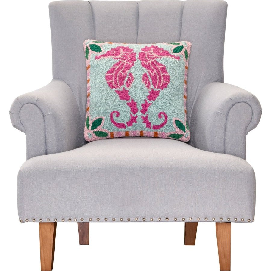 Preppy Seahorse Hooked Wool Throw Pillow on an armchair, showing the throw pillow at room scale, 16x16 inch