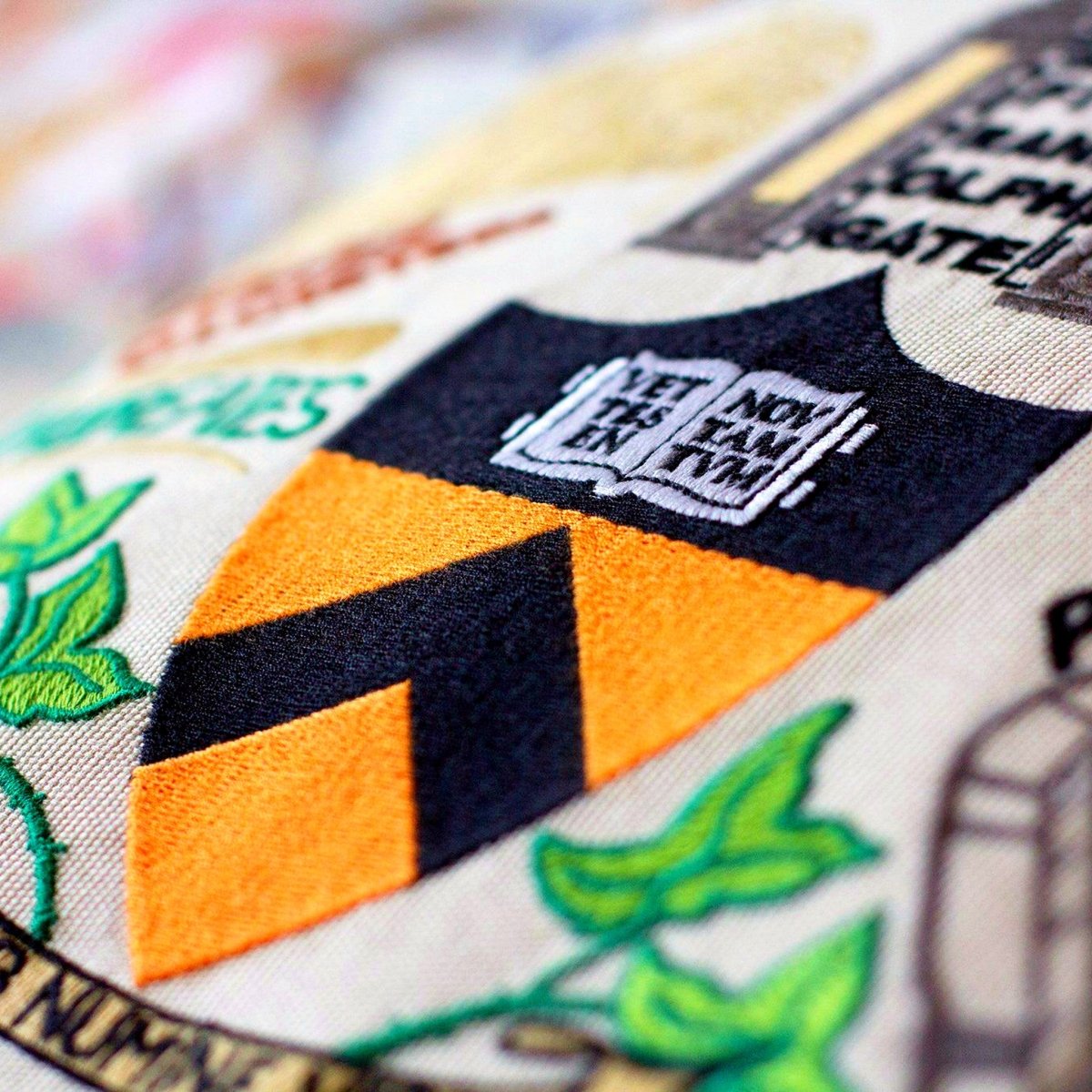 Princeton University Tigers Embroidered College Pillow - close-up detail of hand-embroidered needlepoint stitching