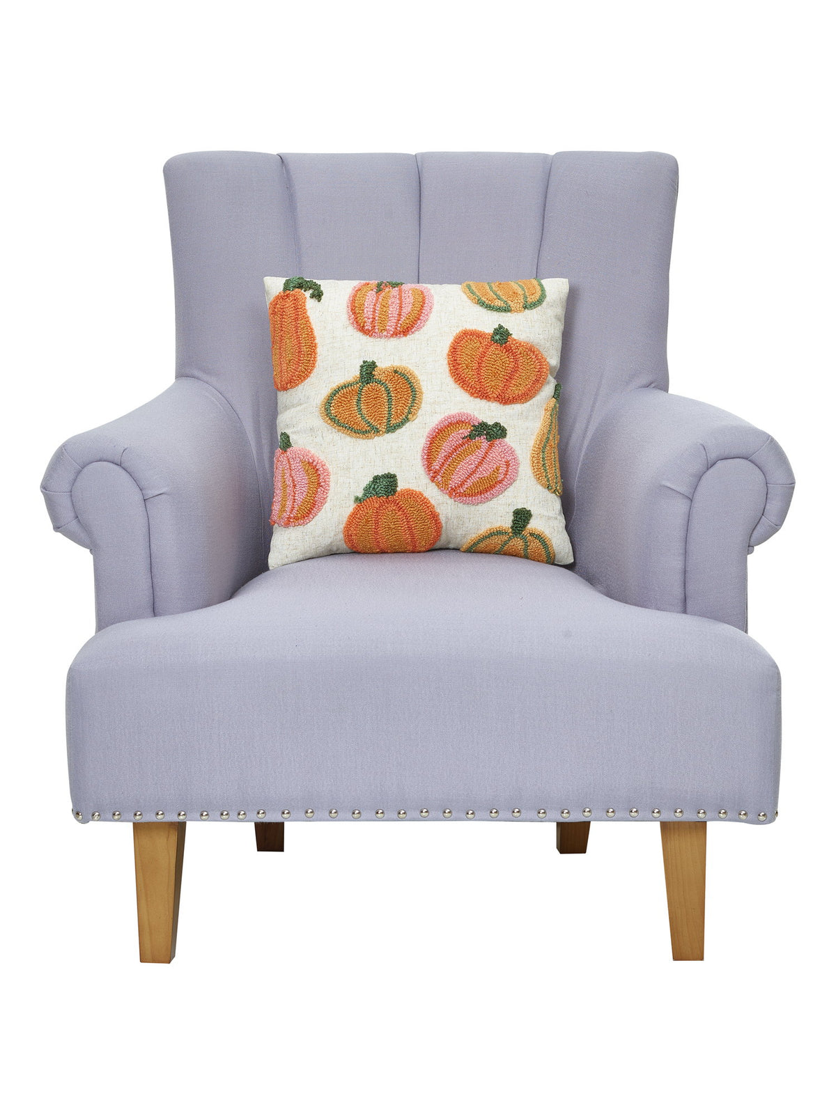 Pumpkins All Over Hooked Throw Pillow on an armchair, showing the throw pillow at room scale, 16x16 inch